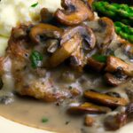 Savory Slow Cooker Pork Chops in Creamy Mushroom Gravy